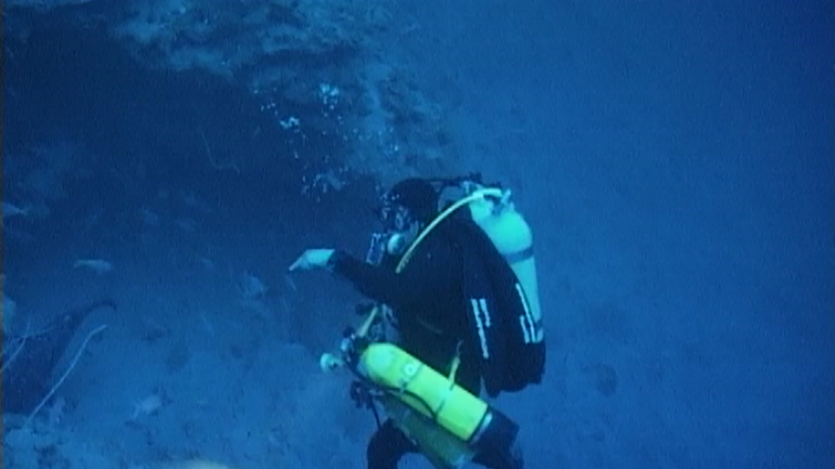 Nuno indicates location of a Coelacanth (Credit Pieter Venter)